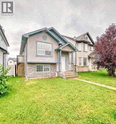 202 Saddlemead Green NE