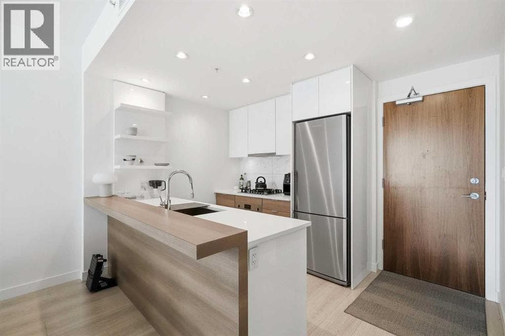 303, 138 waterfront Court SW