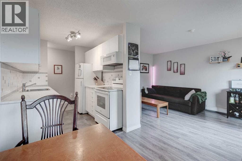 811, 11620 Elbow Drive SW