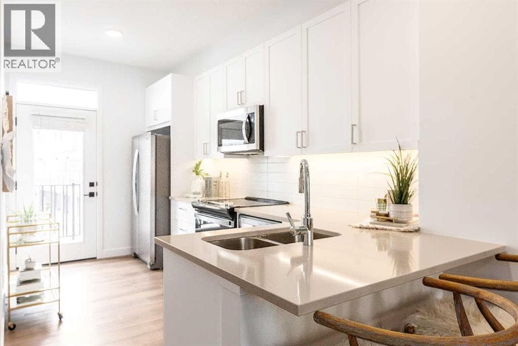 106, 272 Heirloom Crescent SE