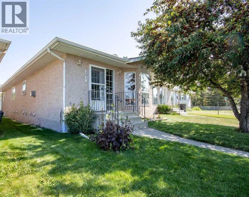 303B Centre Street N