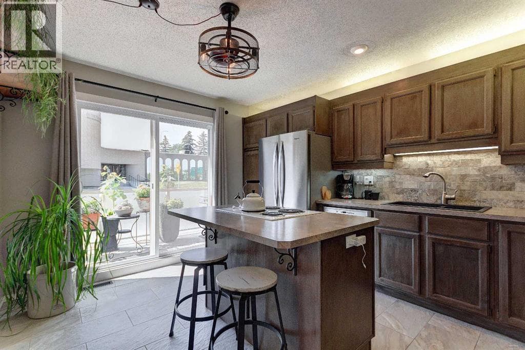 103, 1305 Glenmore Trail SW